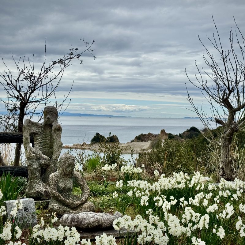 Stone Monument and Flowers
